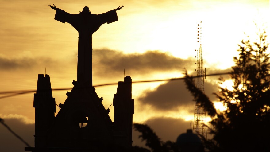 The sun sets behind a church in the Pittsburgh Diocese, one of six dioceses mentioned in the massive report on sexual abuse among Pennsylvania clergy.