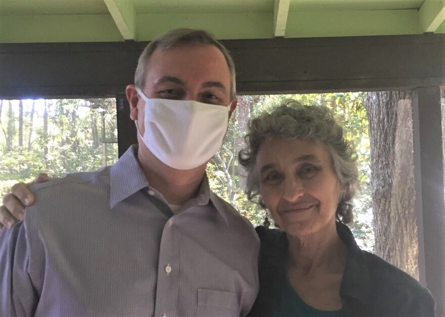 Rick Minor and Pam Hall pose for a picture.