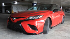 A red TRD Camry.