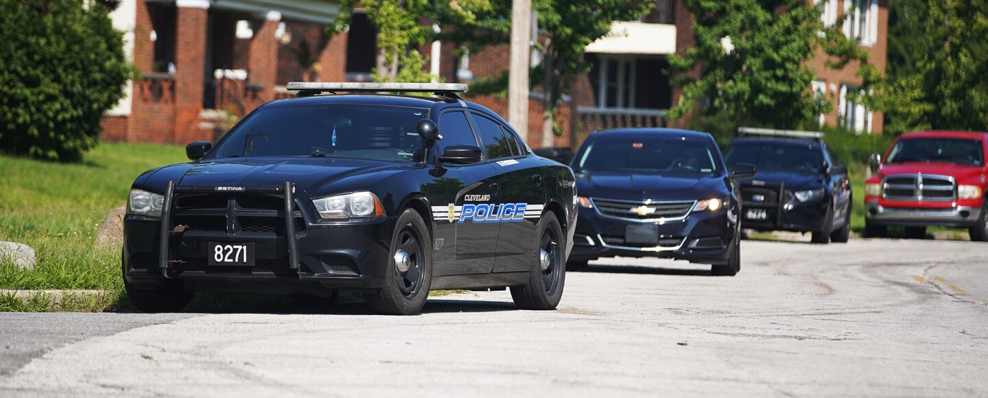 Cleveland Division of Police vehicles are parked near the agency's Fourth District headquarters on Wednesday, Aug. 16, 2023.