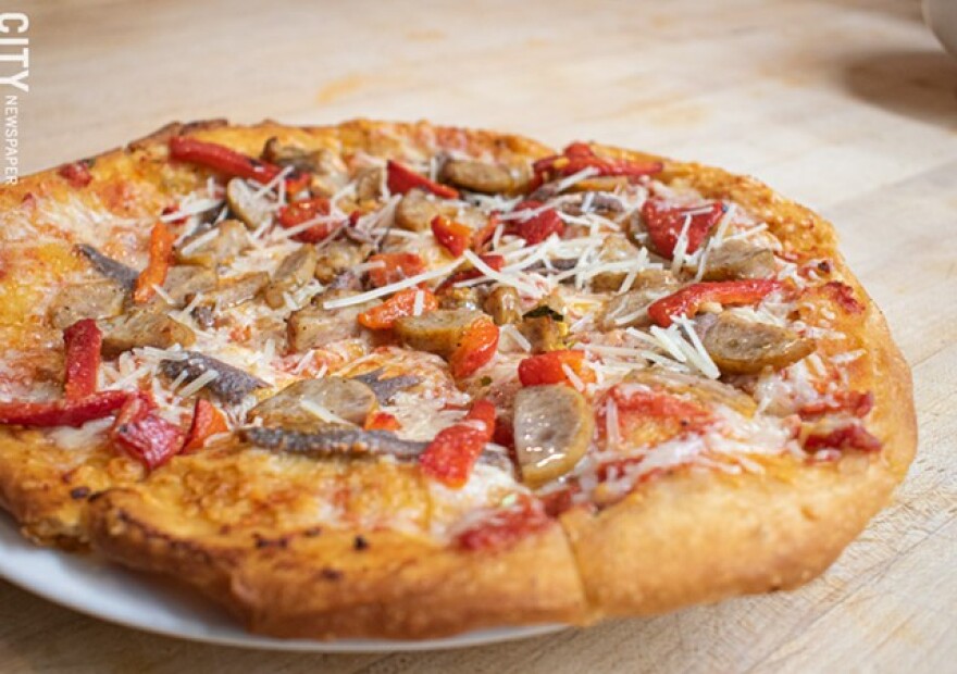 Paulino's specialty, fried pizza.
