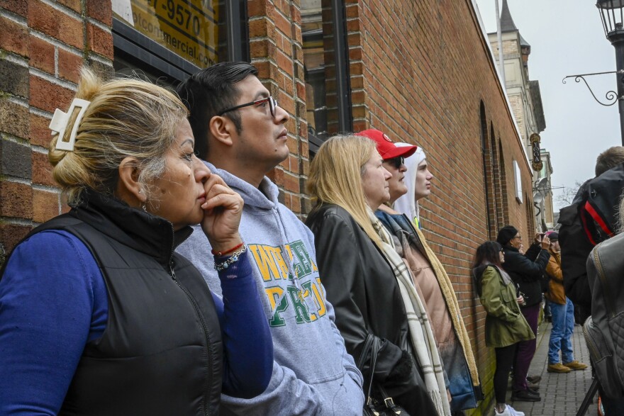 From across the street, passersby watched as rubble was collected and investigation continued as the collapse of the former First Congregational Church on Union Street.