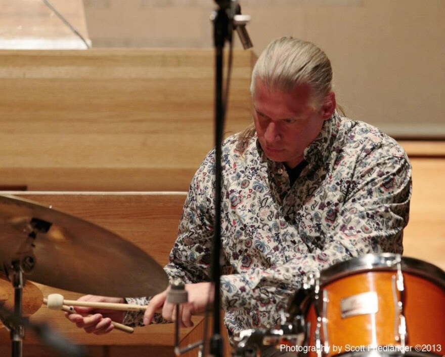 Chonto, a St. Ambrose University alum, playing the drums.