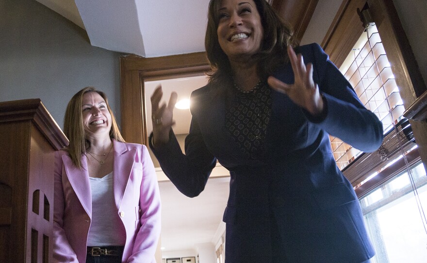 Liz Adelman (left) hosted presidential candidate Sen. Kamala Harris, D-Calif., in her Des Moines home. Adelman says it's surreal to host a candidate in her living room.