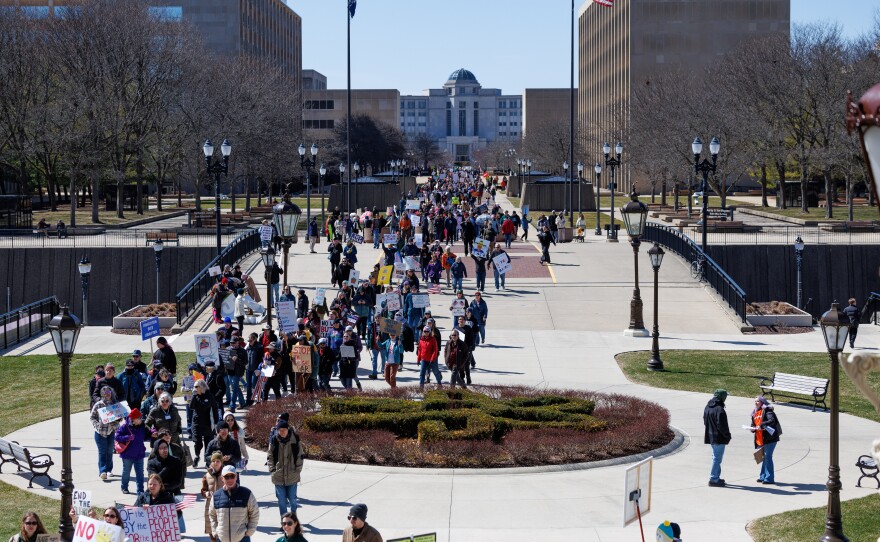 Thousands gathered at the Michigan Capitol in Lansing, Mich., on March 28, 2026, for a No Kings rally.