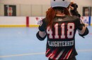 Valeria Gambrel, known on the track as Slaughterher, gears up for practice ahead of the team's first home game. Gambrel has been playing with the club since she was in sixth grade and now plays for the adult team.