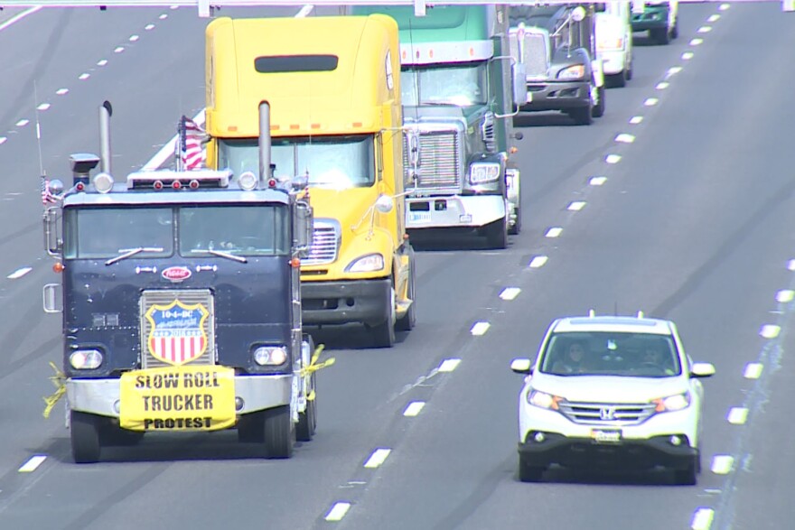 Convoy of semi-trucks on I-465