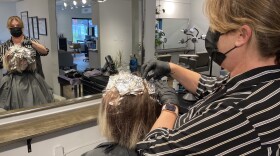 Nashville stylist Betsy Briggs Cathcart was trained to recognize signs of domestic violence and give out information about where victims can find help. (Natasha Senjanovic/WPLN)