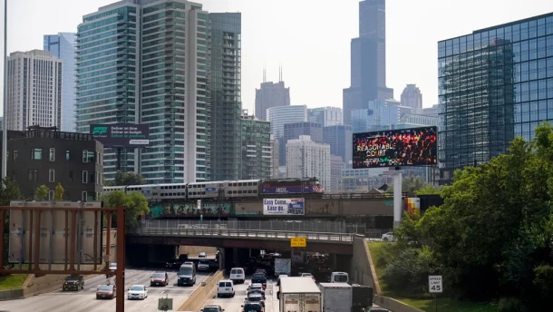 A Metra commuter train operated by Illinois' Regional Transportation Authority travels to downtown Chicago over Kennedy Expressway on interstate 90 and 94 in 2022. RTA will be replaced by a new board on Sept. 1.