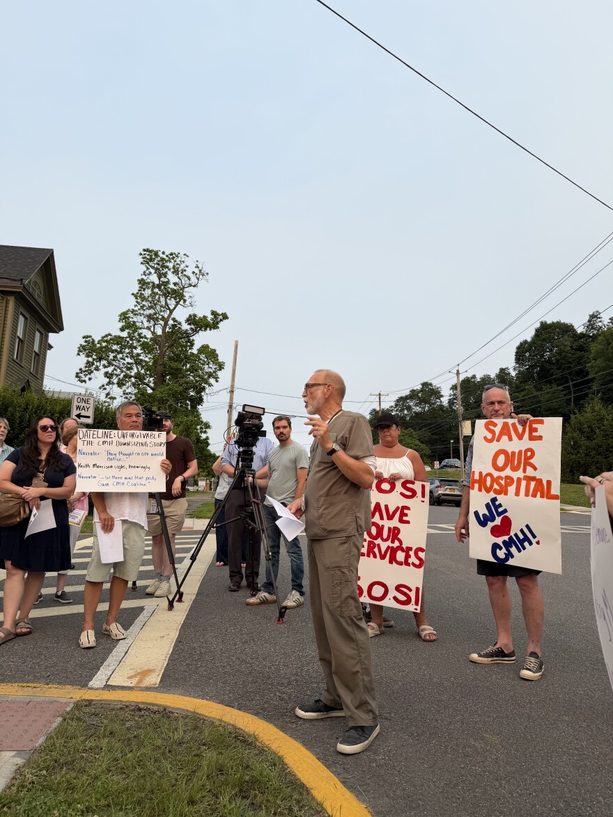 X-ray technician Rob Anderson speaks at a rally outside CMH.