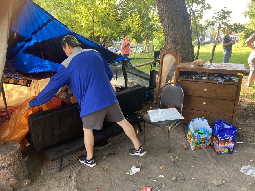 What was left of a homeless encampment on Loomis Street near Joseph Avenue. City of Rochester employees dismantled it Thursday.