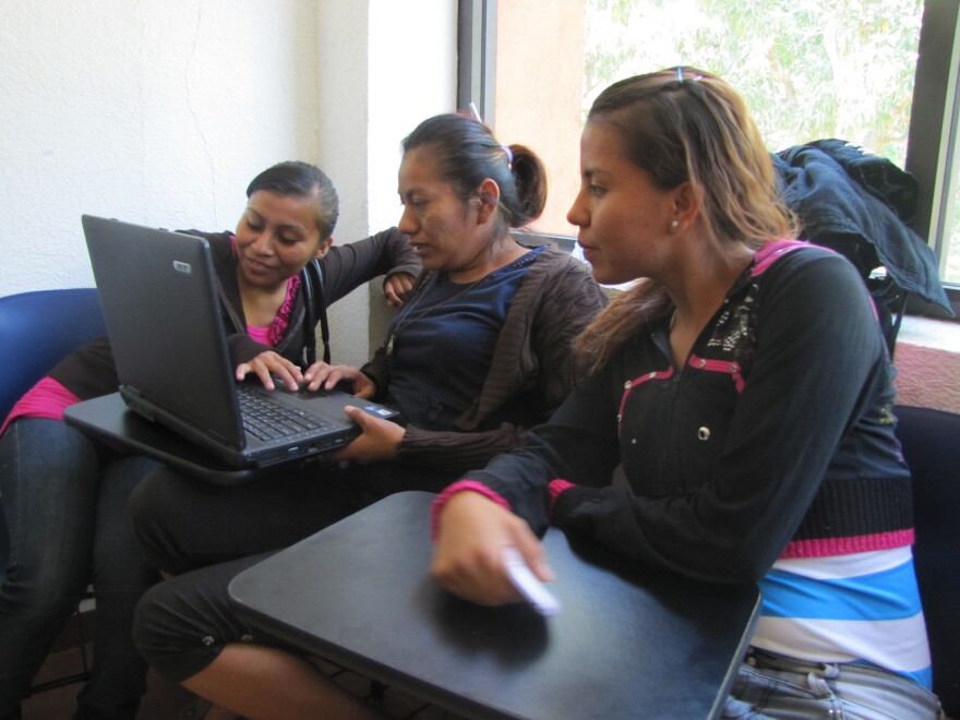 Students at Mexico's first public midwifery school study together after class.  