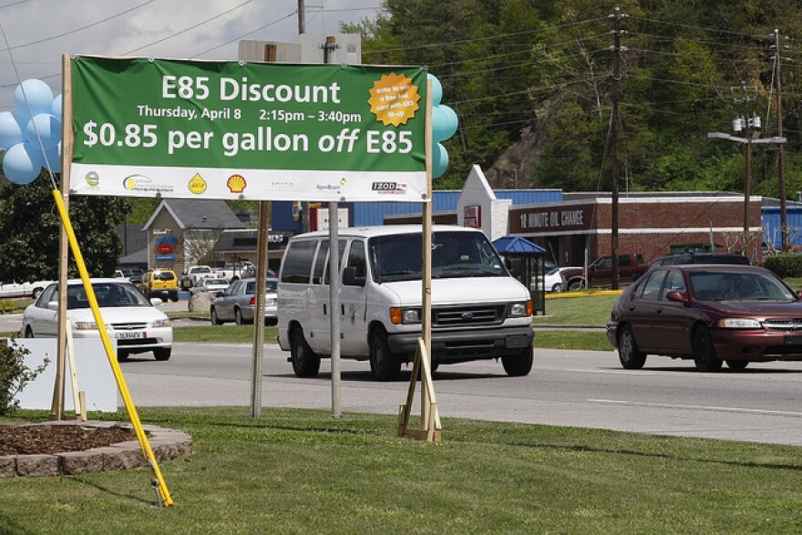 A sign for discounted E85 ethanol fuel. A requirement for alternative fuels in state vehicles has been removed from the Ohio Department of Transportation budget. gas cars