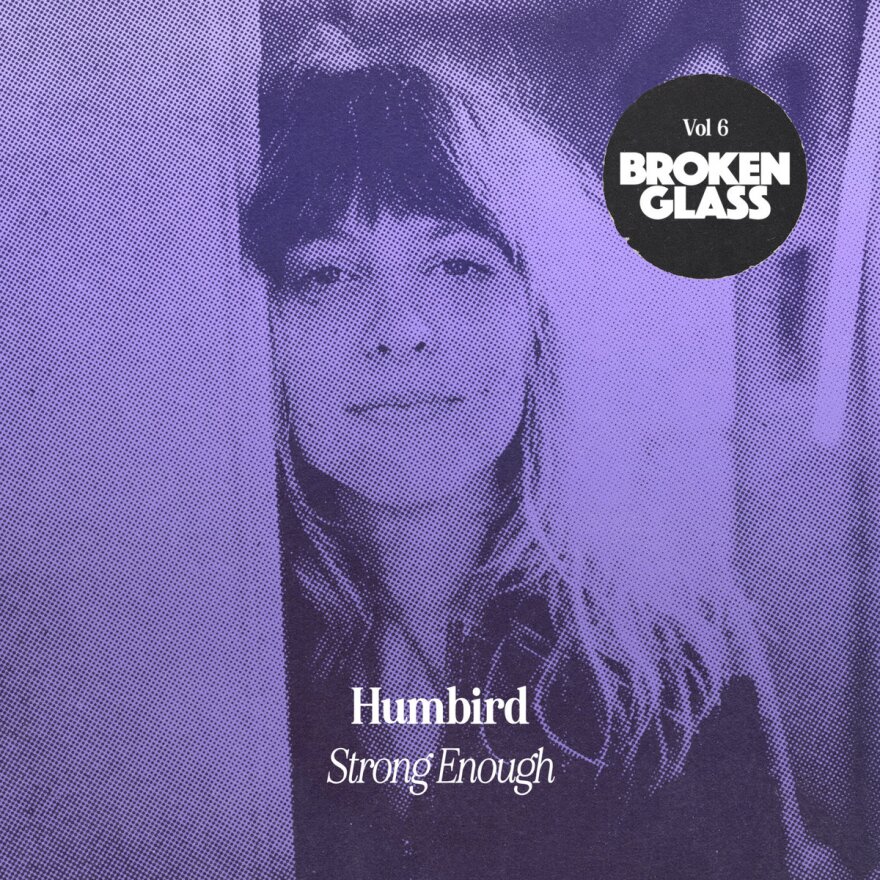 A purple tinted image of Siri Undlin who performs as Humbird. In white letters "Humbird" and "Strong Enough".