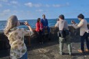 U.S. lawmakers Pramila Jayapal, D-Wash., center left, and Jonathan Jackson, D-Ill., pose for photojournalists at the Malecon in Havana, Saturday, April 4, 2026.