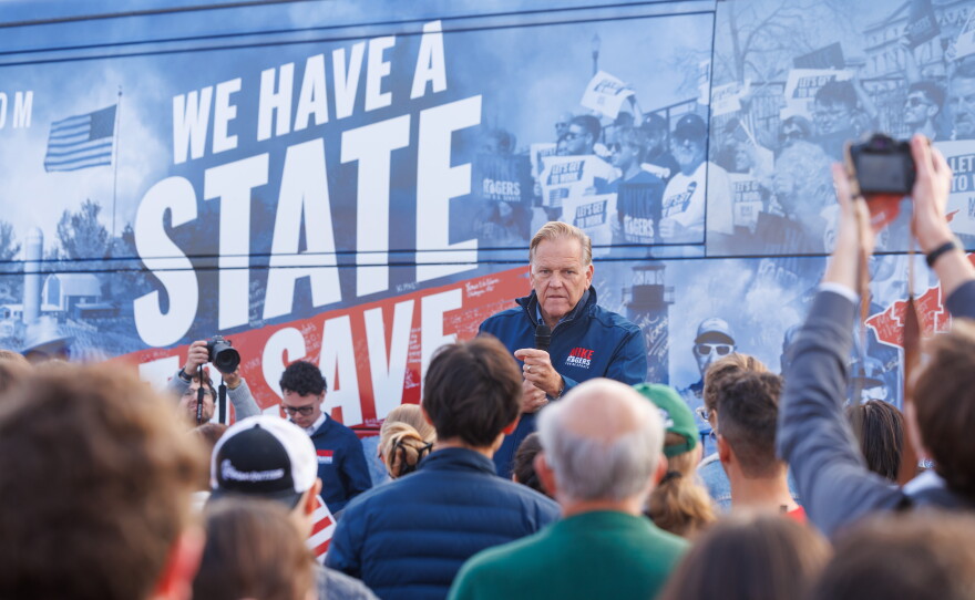 Republican U.S. Senate nominee Mike Rogers speaks in Lansing Township, Mich., on Oct. 24, 2026, during a stop on his "We Have a State to Save" bus tour.