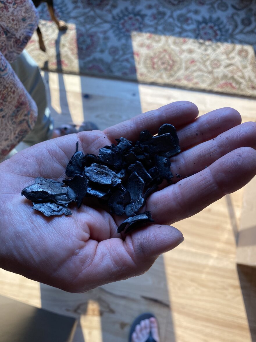 Large embers from the Lava Fire were falling around Amy Kolb Tucker's house on Monday before she evacuated.