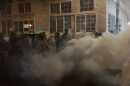 Federal officers spray and throw chemical gases at demonstrators a block up from the ICE processing facility south of downtown Portland on Saturday, Oct. 5, 2025.