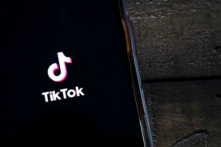 In this photo illustration, the TikTok app is displayed on an Apple iPhone on Aug. 7, 2020 in Washington, D.C.