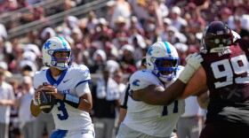 Kentucky quarterback Kenny Minchey (3) throws a pass against Texas A&M during the first half of an NCAA college football game Saturday, Sept. 19, 2026, in College Station, Texas. (AP Photo/David J. Phillip)