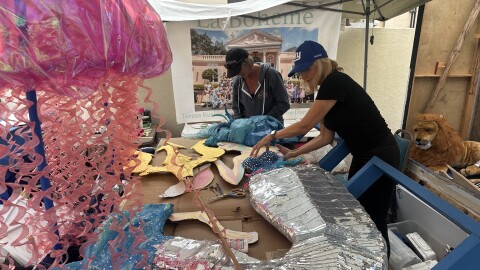 Volunteers work on one of the floast for the 2026 Santa Barbara Summer Solstice Parade.