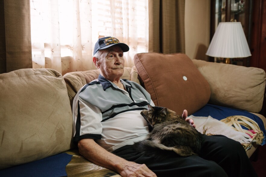 Harry Bollinger, 88, of Freeport, Pa., pauses as he talks about his recovery from mustard gas exposure as part of an experiment at the Naval Research Laboratory in Washington, D.C.