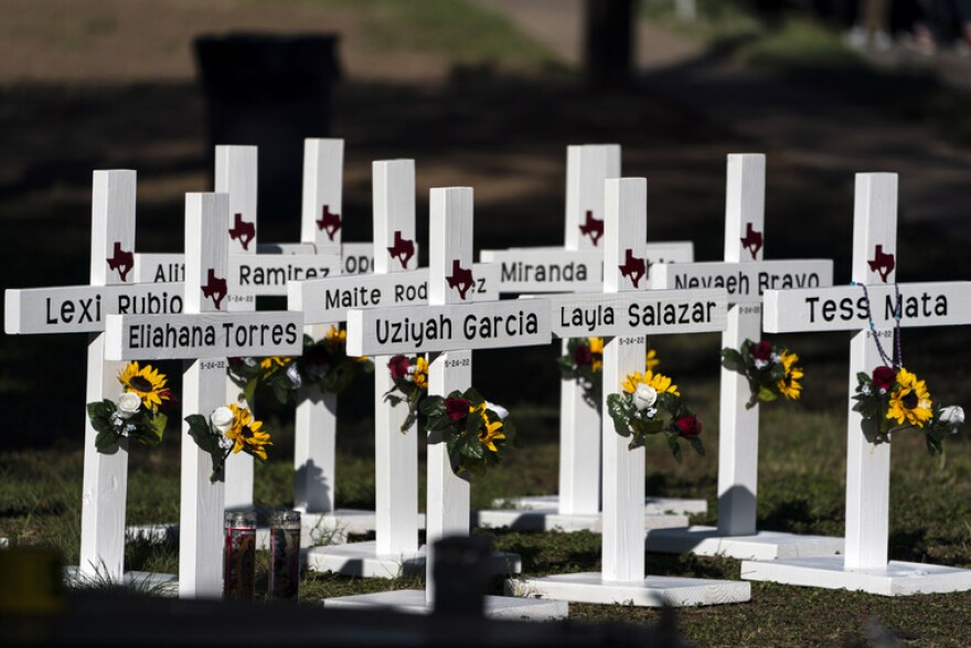 Crosses with the names of Tuesday's shooting victims are placed outside Robb Elementary School in Uvalde, Texas. | Jae C. Hong/AP Photo