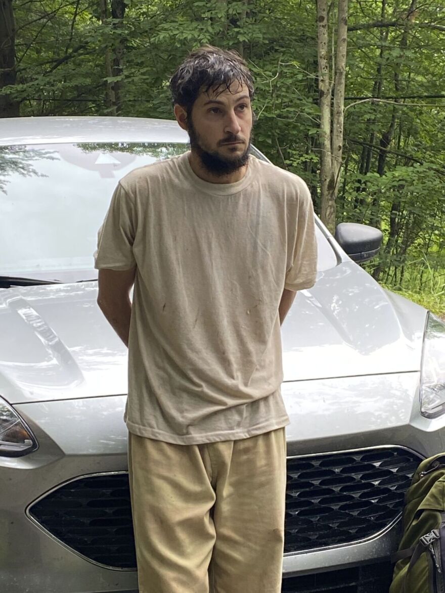 This image provided by Pennsylvania State Police shows Michael Burham, a homicide suspect who used bed sheets to escape a northern Pennsylvania jail after being captured.