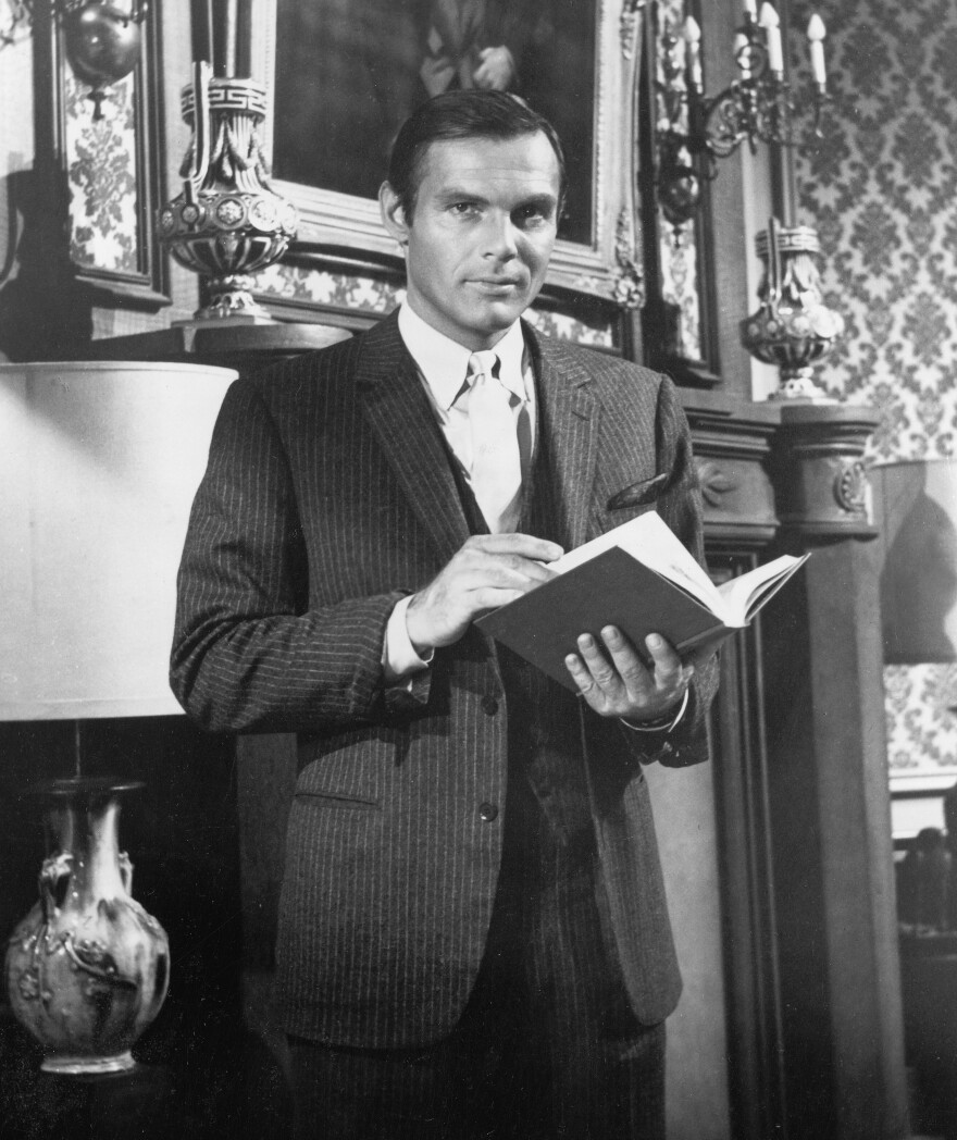 Adam West played Bruce Wayne/Batman in the 1960s TV series <em>Batman.</em> Weldon says many Batfans feel Batman is a relatable superhero because his appeal isn't really about having superpowers. But that overlooks one important point, says Weldon. "He <em>does</em> have a superpower: It's wealth."