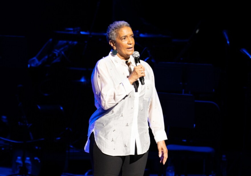 Camille R. Love addressing the nearly sold-out crowd at the recent 'WCLK AT 50' presented by the Atlanta Jazz Festival.
