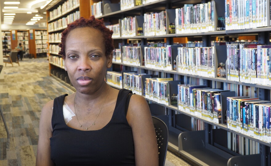 Darlisha Moore has been living between hotels and her car since January. She's been diligent about checking with local housing resources to get permanent housing, but has found herself "going around in circles, looking crazy."