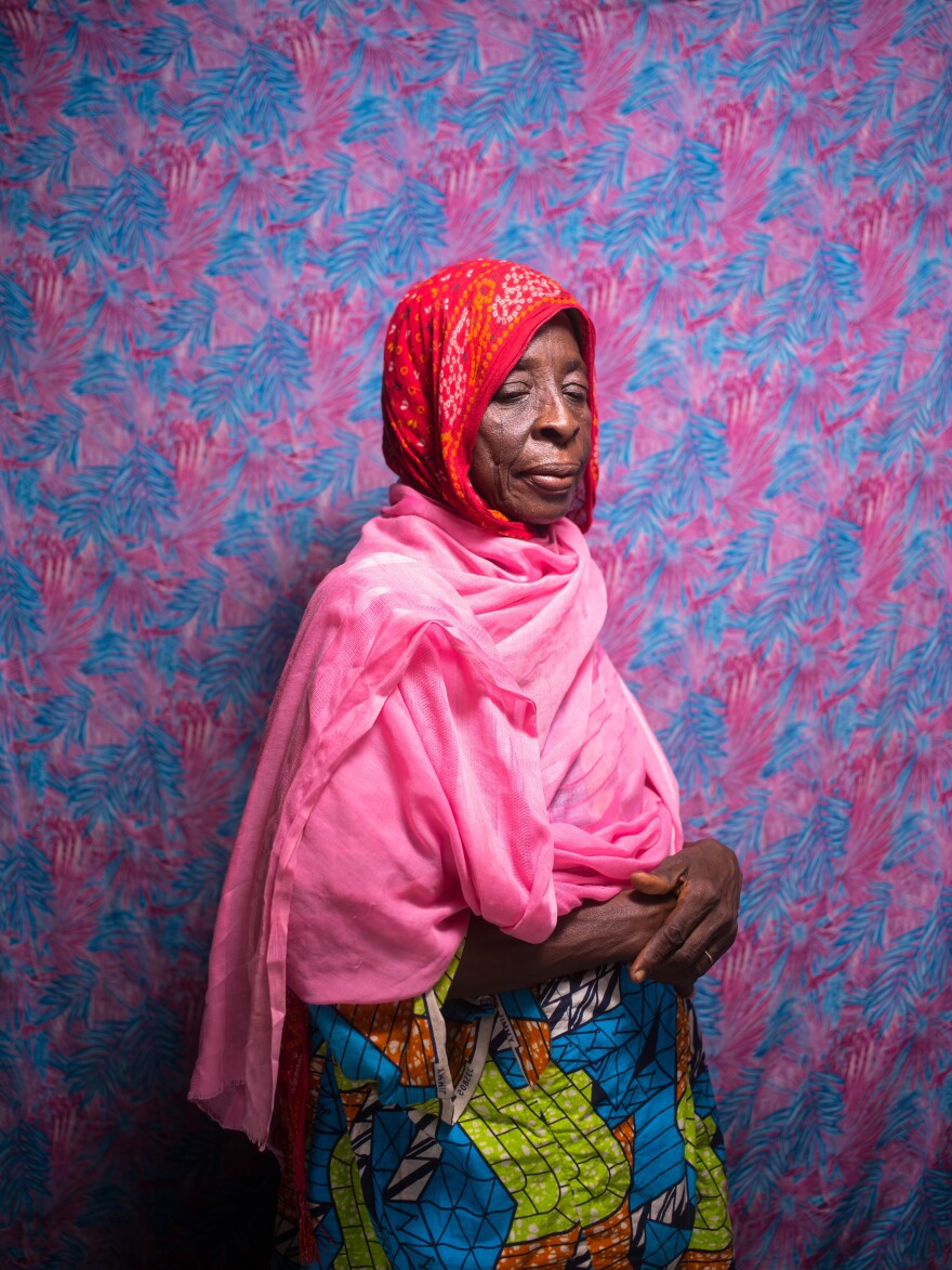 Falmata Ahmoduram, 70, is from Baga, a Nigerian fishing community near the border with Chad. She was displaced by fighting; her husband and one son went missing. Her five other children previously died of disease or natural causes. She now cares for her four grandchildren: "These grandchildren are all that I have."