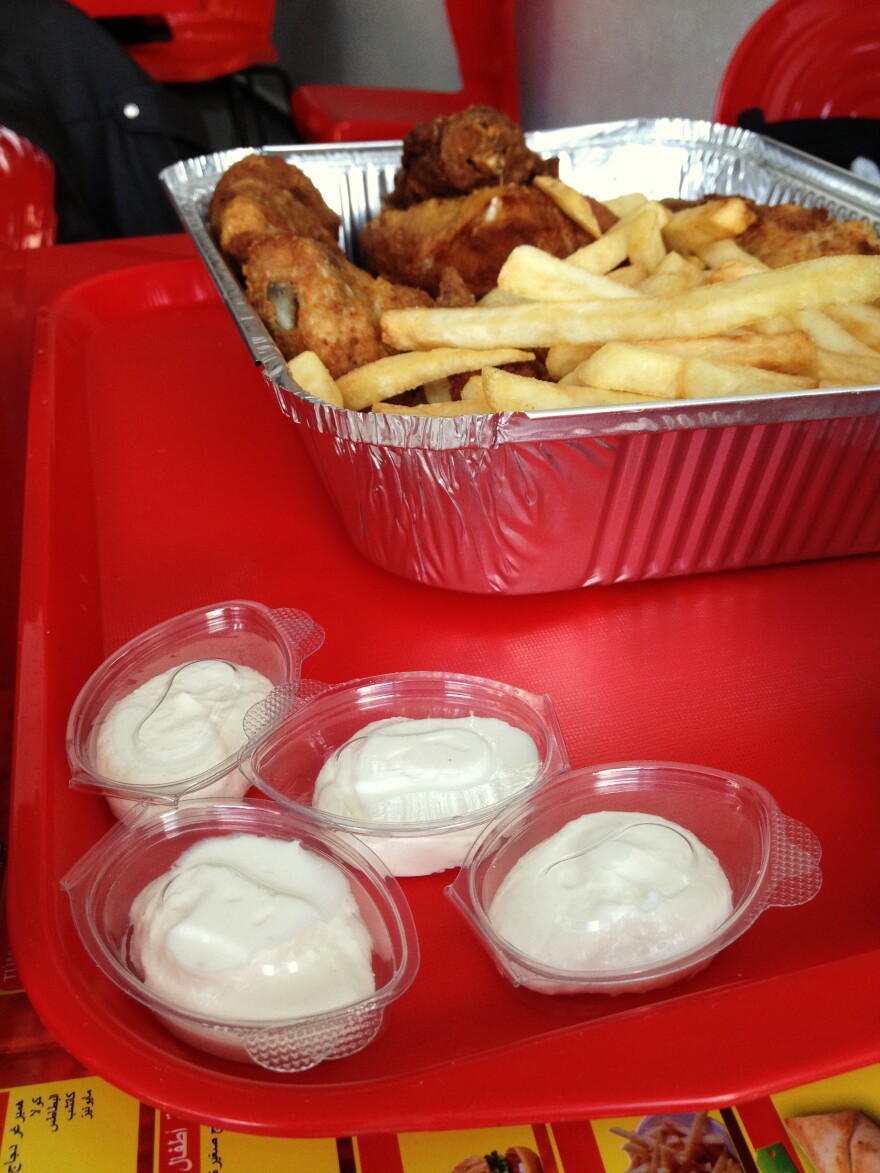 Syrians flocked to the recent opening of a new restaurant in Gaziantep serving a creamy garlic sauce known as <em>creme toum</em>. It's a sign that some Syrians are beginning to think about Gaziantep as more than just a temporary home.