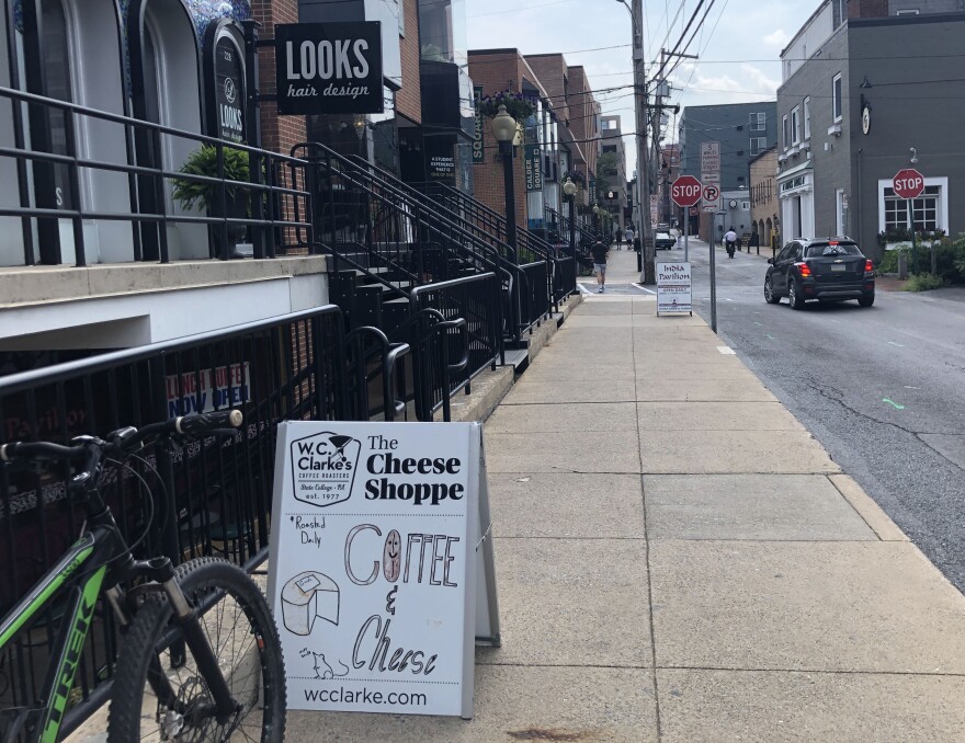 Sign outside of The Cheese Shoppe on Calder Way in State College, PA. 