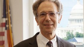 U.S. Agency for Global Media CEO Michael Pack is seeking to retain control over networks such as Radio Free Europe/Radio Liberty even after the incoming Biden administration replaces him.