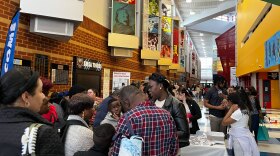 Attendees are waiting in line to check in at the Bilingual Financial Literacy Symposium that was being held on Saturday, May 31st, 2025 at the Sport and Medical Sciences Academy in Hartford. Over 200 people registered to attend the symposium, the second of its kind that the city’s Treasurer’s Office has put on.