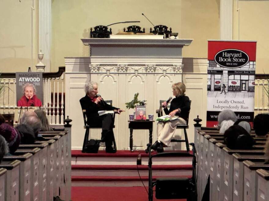 Margaret Atwood (left) talks with host Robin Young (right) at First Parish Church in Cambridge, Mass. (Robin Young/Here & Now)