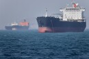 Oil tankers sit at anchor offshore in the Strait of Hormuz off Bandar Abbas, Iran, Saturday, May 2, 2026. (Amirhosein Khorgooi/ISNA via AP)