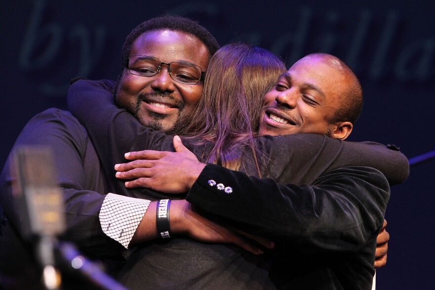 Melissa Aldana congratulates fellow 2013 Monk Competition finalists and friends Godwin Louis (left) and Tivon Pennicott.