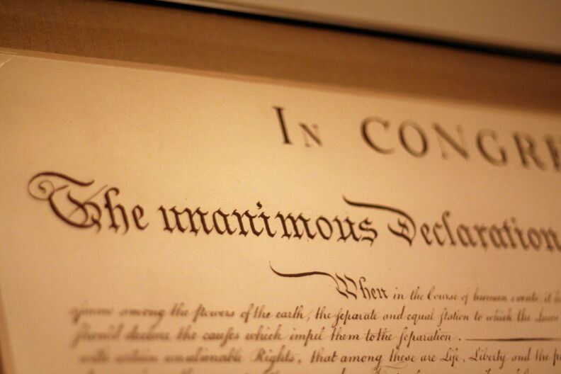 A replica of the Declaration of Independence showing how the document looked the day it was signed, as part of the National Archives exhibit, in Washington, D.C.