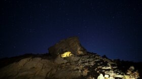 A spear of light is seen on the summer solstice at McKee Springs in Dinosaur National Monument.