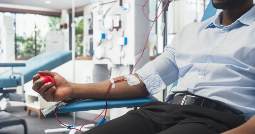 Close Up Shot Of Hand of Blood Donor 