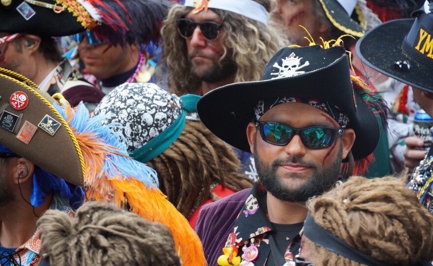Pirates stand on the Jose Gasparilla boat during the invasion on Jan. 31, 2026.