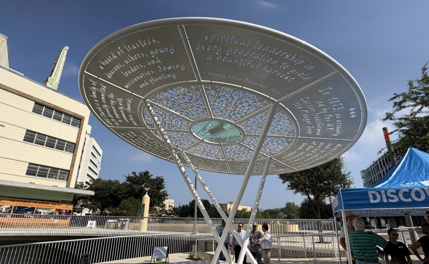 The artwork is two separate pieces. This one has Andrea Vocab Sanderson's poem cut into it