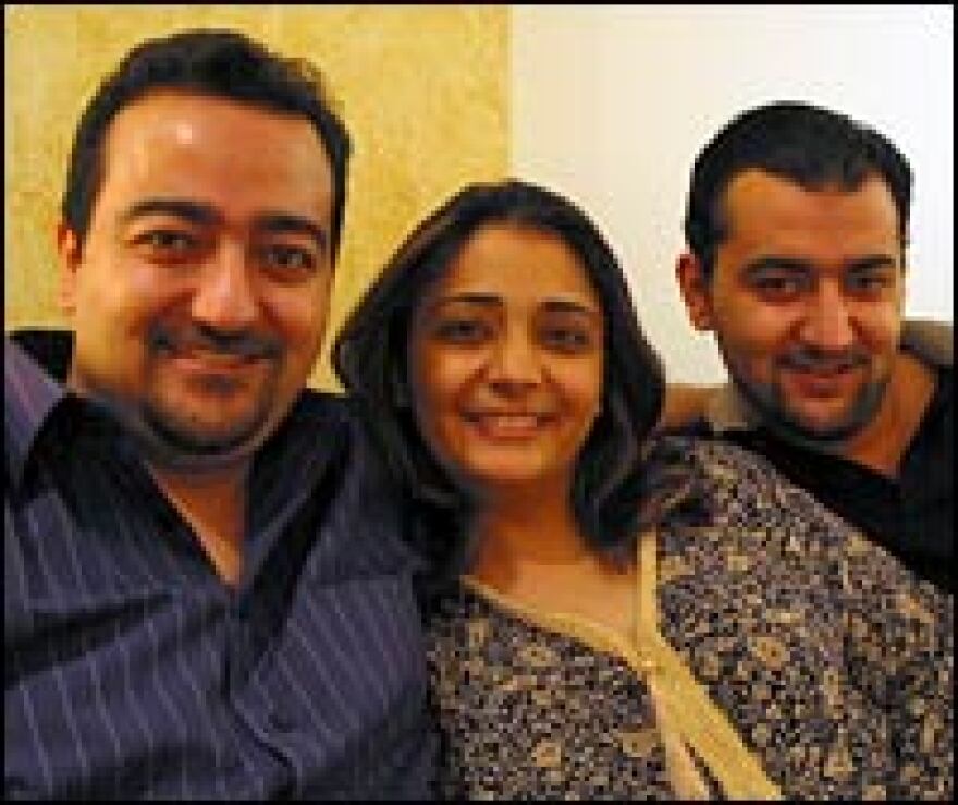 From left, Hadi Abushahla, his wife Natali and brother Omar.  