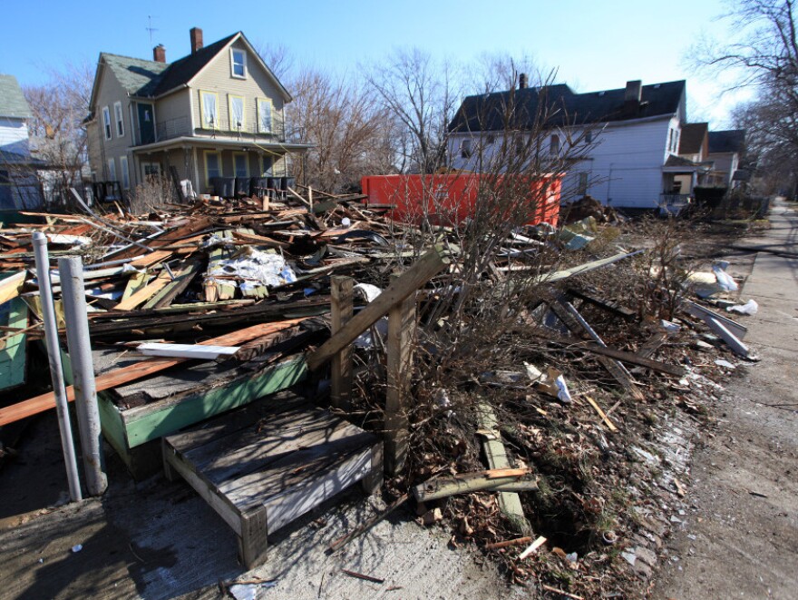 The remains of a Cleveland house after demolition in February. Ohio has set aside $75 million to raze abandoned homes across the state. 