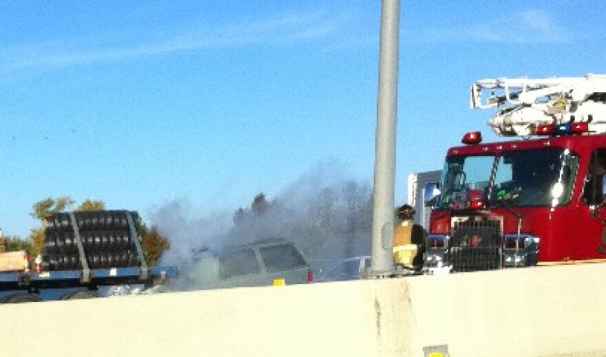 Smoke fills the air after an SUV slams into a trailer on Highway 169.
