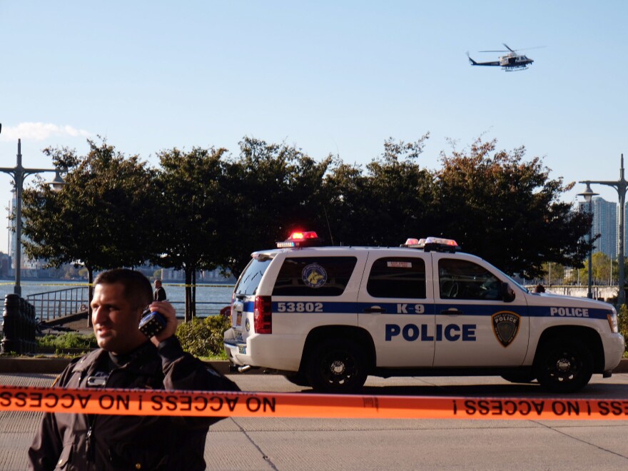 Police gather at the scene of Tuesday's attack in New York City.