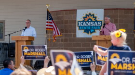 Democratic pastor Adam Hamilton and Republican U.S. Sen. Roger Marshall debate Sept. 12, 2026, at the Kansas State Fair in Hutchinson.