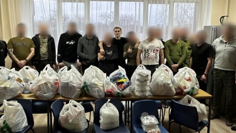 David Pavenko, center, brings supplies to frontline soldiers in Ukraine.